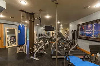 gym room with several equipment in great condition