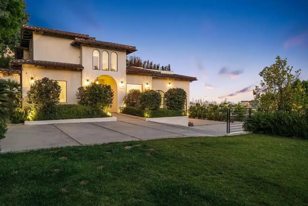 vine front yard with grass and city